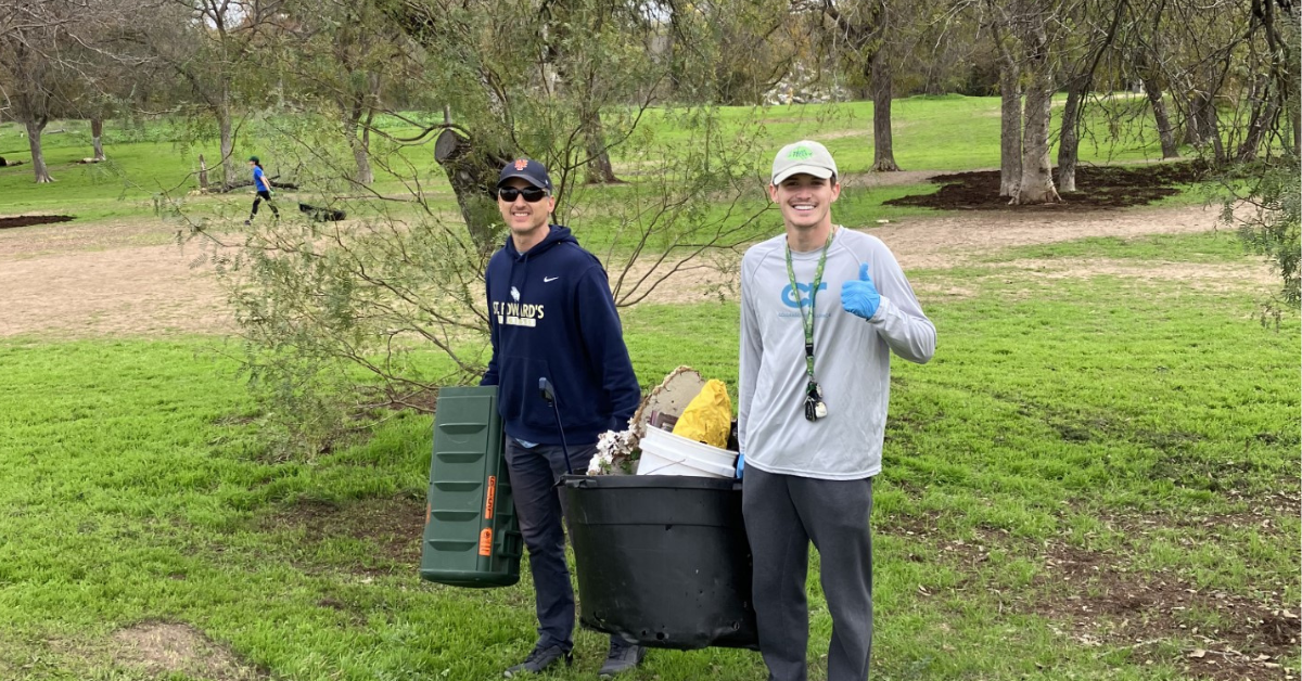 Father and son volunteering at Onion Creek