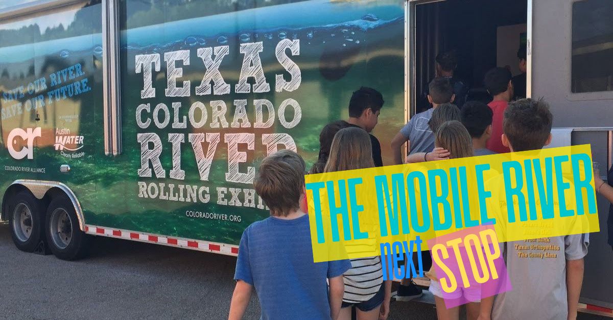 children entering The Mobile River rolling education exhibit about the Texas Colorado River