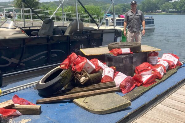 Lake Austin Cleanup - boat and bags